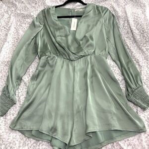 NWT Short romper dress . Pastel green color.